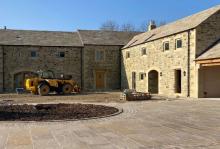 Why choose a local electrician for outdoor lighting installation in Meltham?